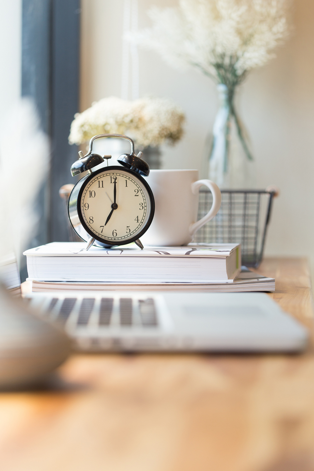 photo of clock on office desk.